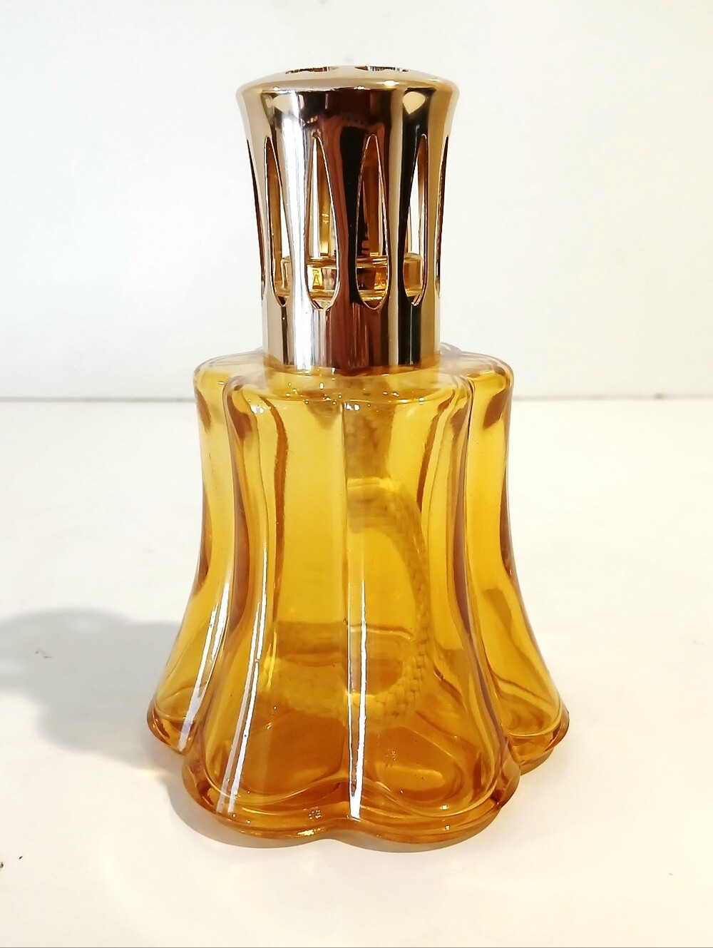 Vinrage Amber Glass Home Accent Berger Lamp with Gold Tone Top
